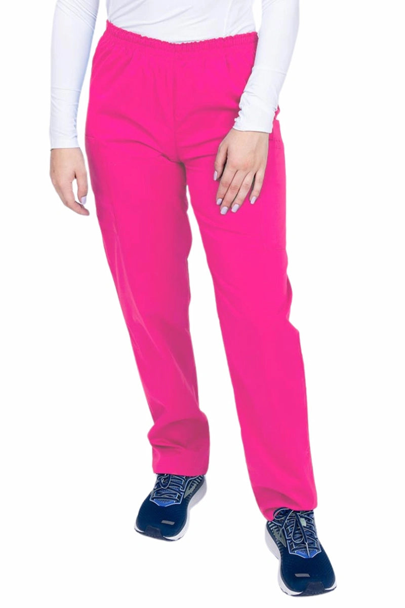 A young woman wearing an Epic by MedWorks Women's Elastic Waist Scrub Pant in shocking pink featuring a tapered leg and elastic waist.