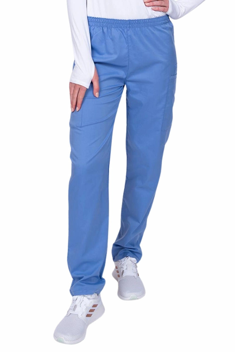 Young woman wearing an Epic by MedWorks Women's Elastic Waist Scrub Pant in ceil featuring a tapered leg and elastic waist.