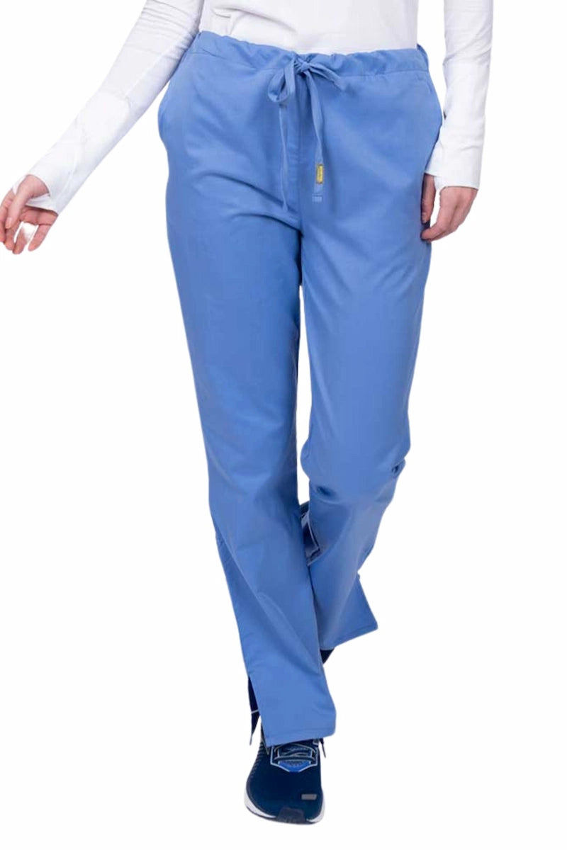 Young nurse wearing an Epic by MedWorks Women's Drawstring Flare Leg Scrub Pant in ceil with unique stretch fabric made of 77% Polyester, 21% Viscose, 2% Spandex.