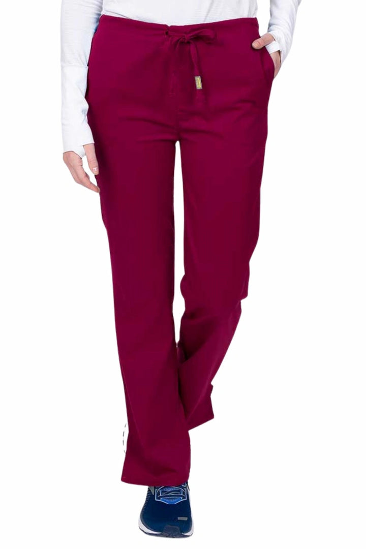 Young nurse wearing an Epic by MedWorks Women's Drawstring Flare Leg Scrub Pant in wine with unique stretch fabric made of 77% Polyester, 21% Viscose, 2% Spandex.