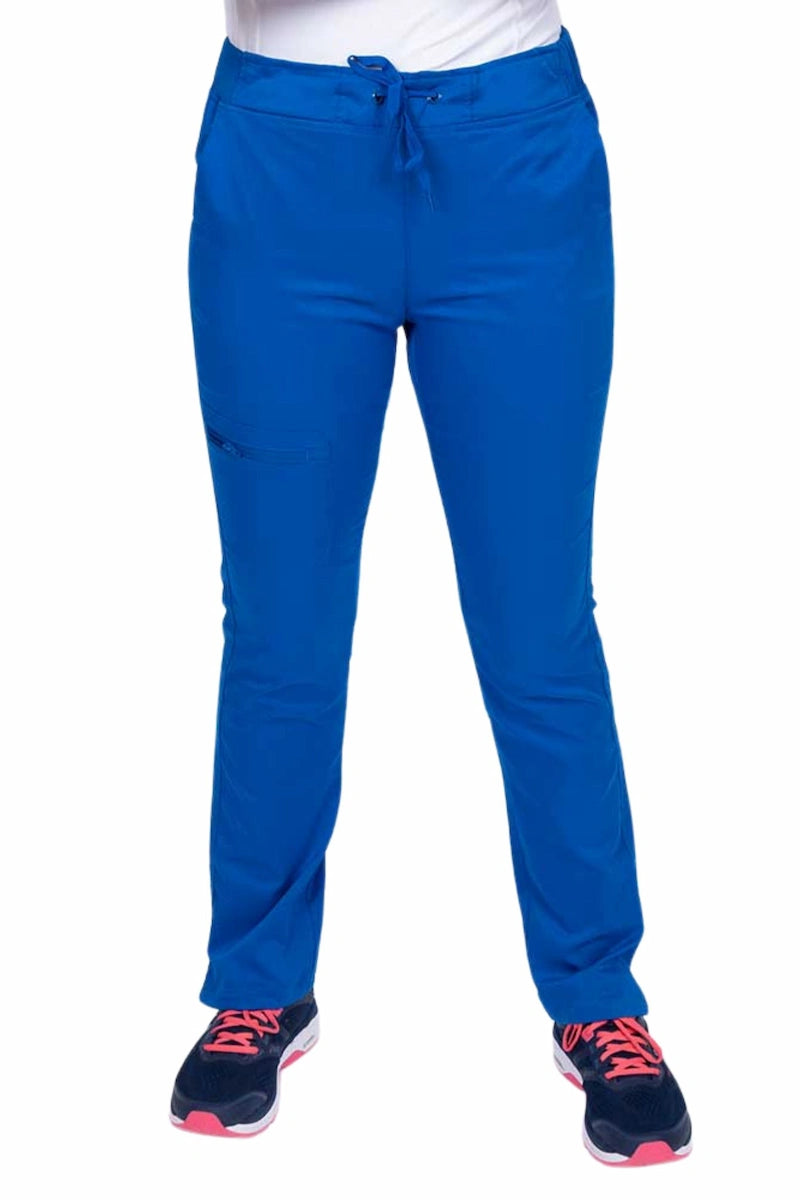 Young healthcare worker wearing an Epic by MedWorks Women's Blessed Skinny Yoga Scrub Pant in royal featuring side slits for additional range of motion.