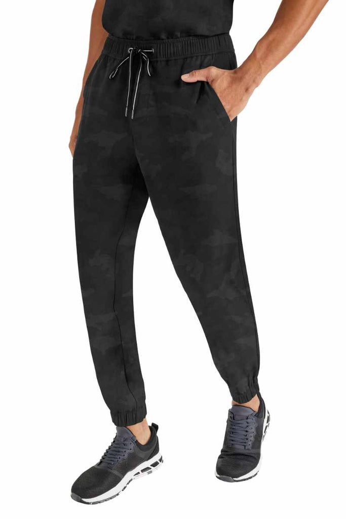 A side view of the Purple Label by Healing Hands Men's Drew Joggers in Black size Large featuring a drawstring waistband.