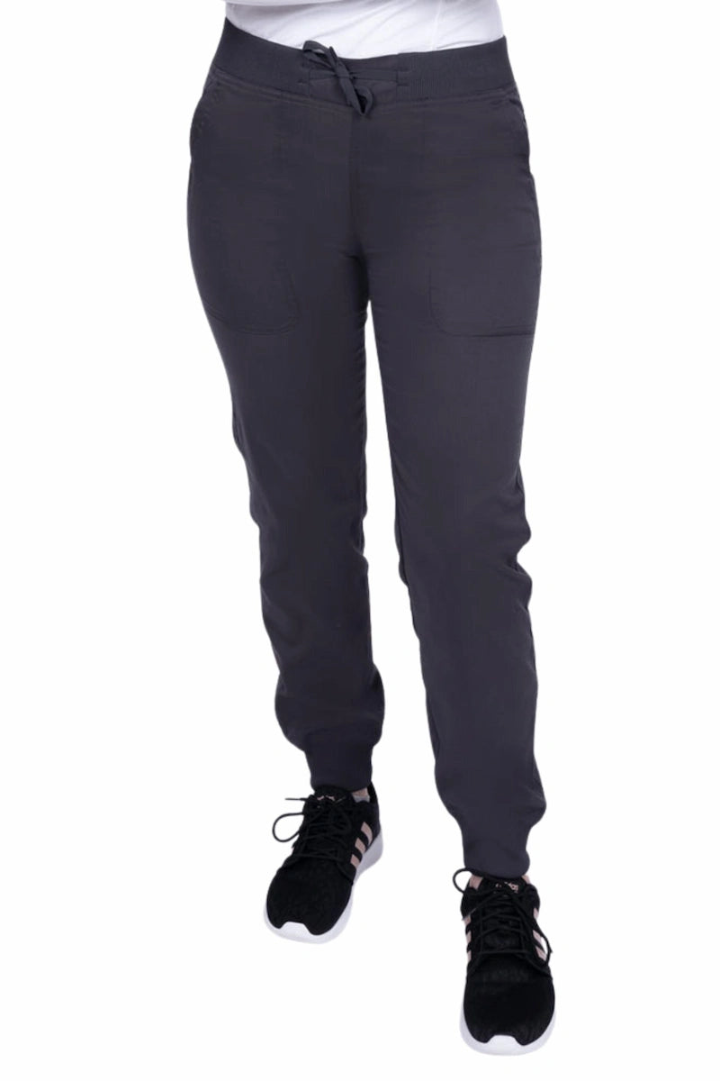 A young female Phlebotomist wearing an Epic by MedWorks Women's Yoga Jogger Scrub Pant in Pewter size 3XL featuring a contemporary fit.