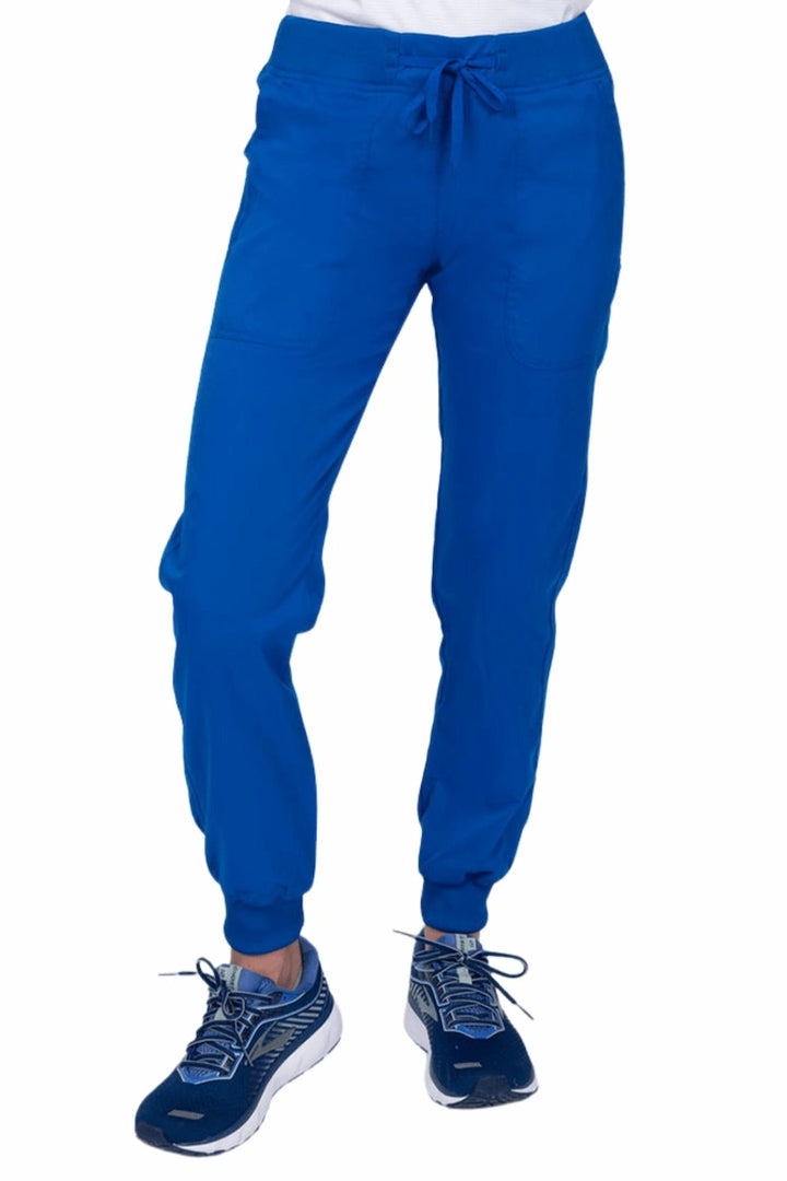 A young female Phlebotomist wearing an Epic by MedWorks Women's Yoga Jogger Scrub Pant in Royal size 3XL featuring a contemporary fit.