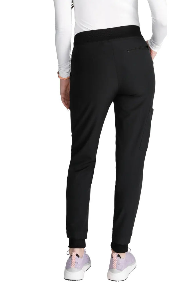 The back of the Allura Women's High Waist Gusset Jogger in Black featuring one back zipper closure pocket.
