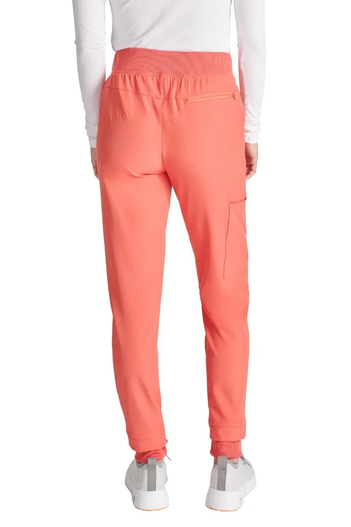 The back of the Allura Women's High Waist Gusset Jogger in Cayenne featuring one back zipper closure pocket.