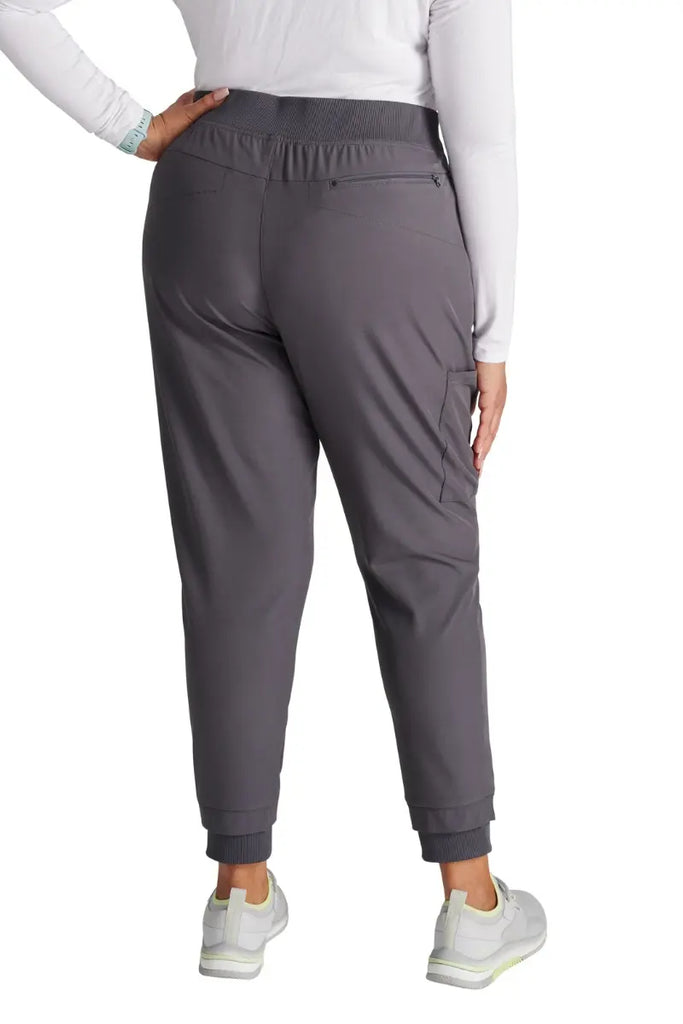 The back of the Allura Women's High Waist Gusset Jogger in Pewter featuring one back zipper closure pocket.
