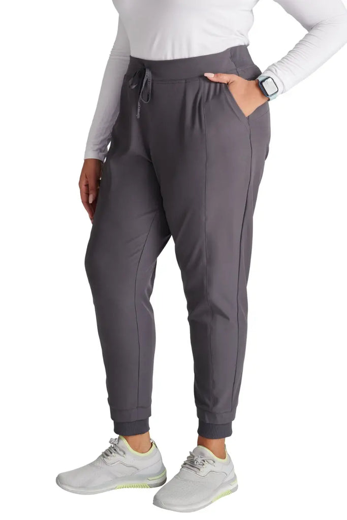 The Allura Women's High Waist Gusset Scrub Jogger in Pewter featuring rib knit cuffs at the ankle.