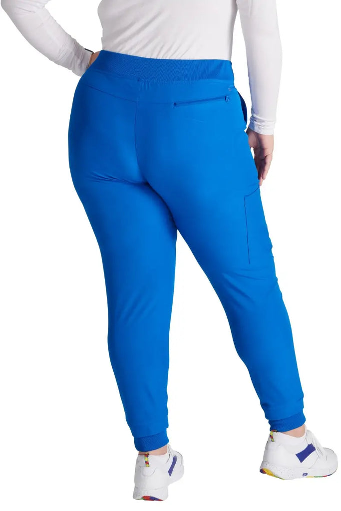 The back of the Allura Women's High Waist Gusset Jogger in Royal Blue featuring one back zipper closure pocket.