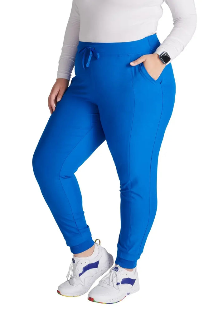 The Allura Women's High Waist Gusset Scrub Jogger in Royal Blue featuring rib knit cuffs at the ankle.