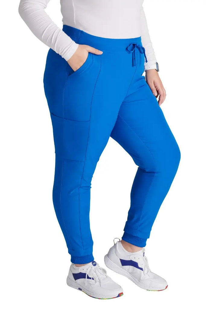 The Allura Women's High Gusset Scrub Jogger in Royal featuring two roomy front angled pockets.