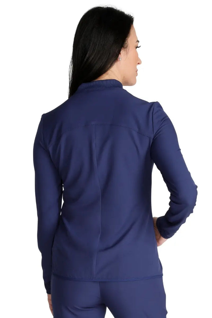 The back of the Allura Women's Zip-Up Scrub Jacket in Navy size Medium featuring a center back length of 24".