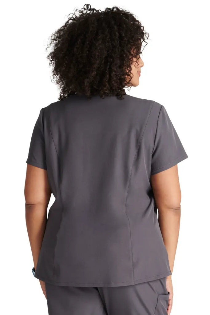The back of the Allura Women's Mitered V-Neck Scrub Top in Pewter Grey featuring a center back length of 25".
