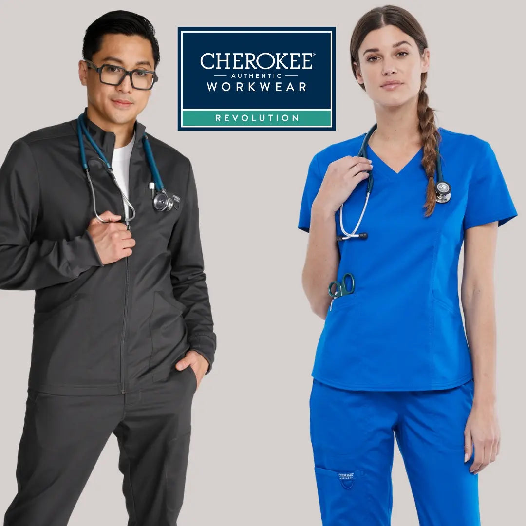 Two young nurses showcasing some of the available scrub options from Cherokee Workwear Revolution  at Scrub Pro Uniforms on a light grey background.