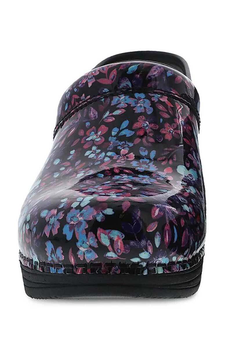 A front view of the Dansko LT Pro Nurse Shoe in "Ditsy Floral Patent" featuring Dansko's wipe clean technology.