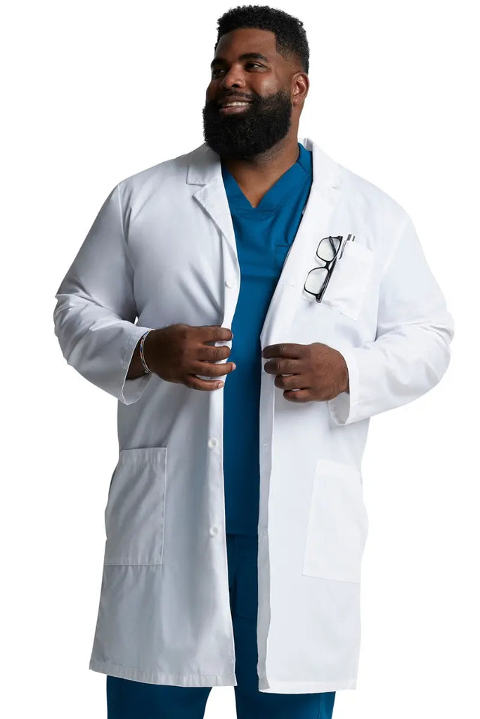 A young Male Surgeon wearing a Dickies Unisex EDS SIgnature Lab Coat featuring a four button front closure.