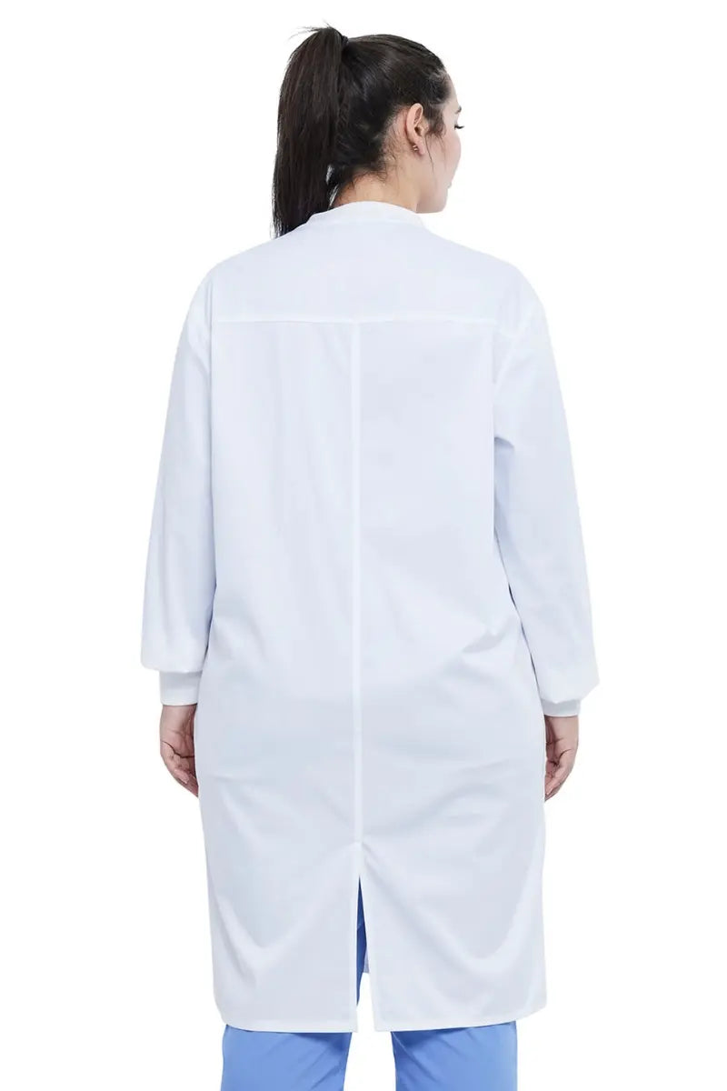 A young female Veterinarian wearing a Dickies Industrial Unisex Snap Front Lab Coat in White size 4XL featuring a 43" center back length.