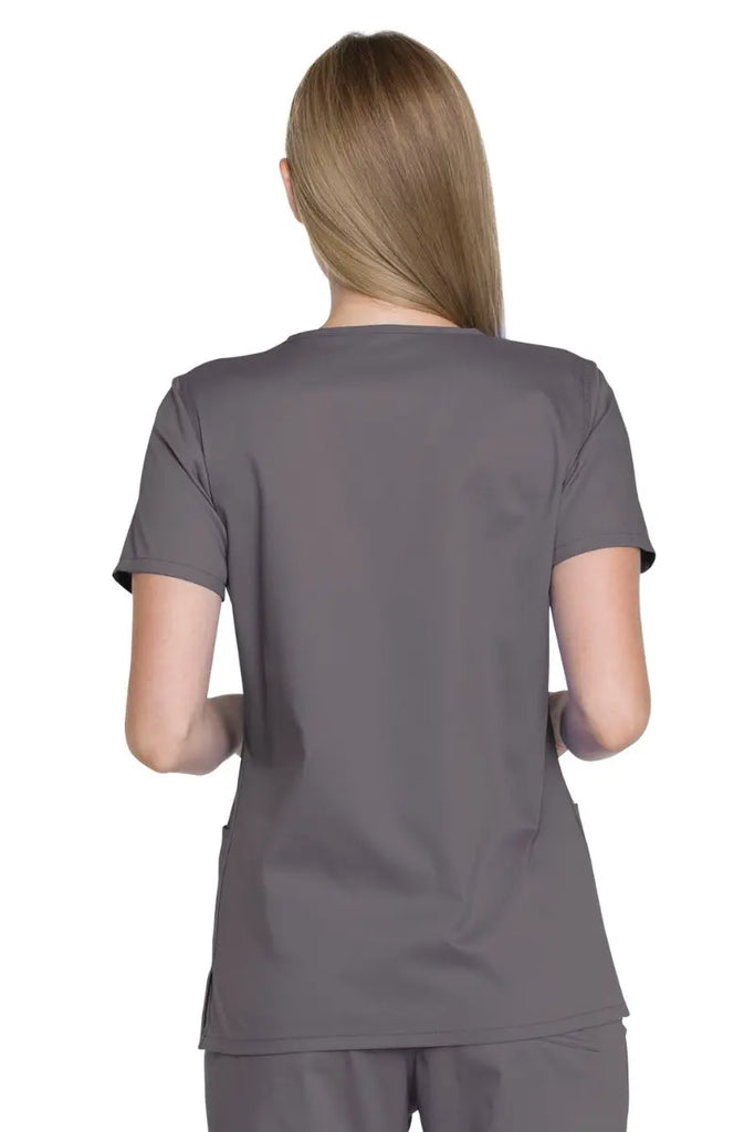 The back of the Dickies Industrial Women's V-neck Scrub Top in Pewter featuring a center back length of 26".