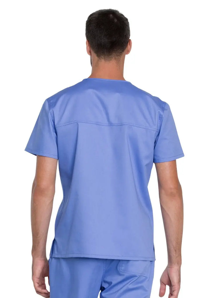 The back of the Dickies Industrial Unisex Tuckable V-Neck Scrub Top in Ceil Blue size Medium designed with a 29" center back to allow for a neat and professional tuck-in.