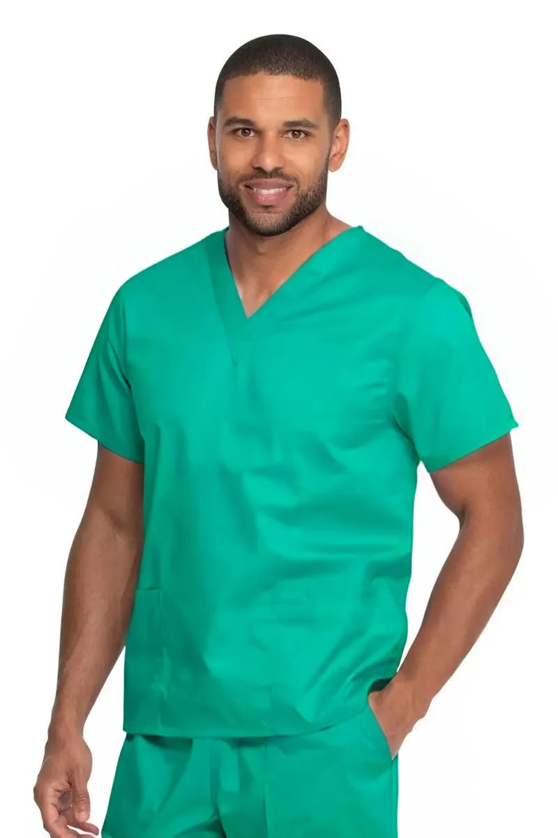 A young male Surgical Asssitant wearing a Dickies Industrial Unisex V-Neck Scrub Top in Surgical Green size 2XL featuring two front patch pockets.