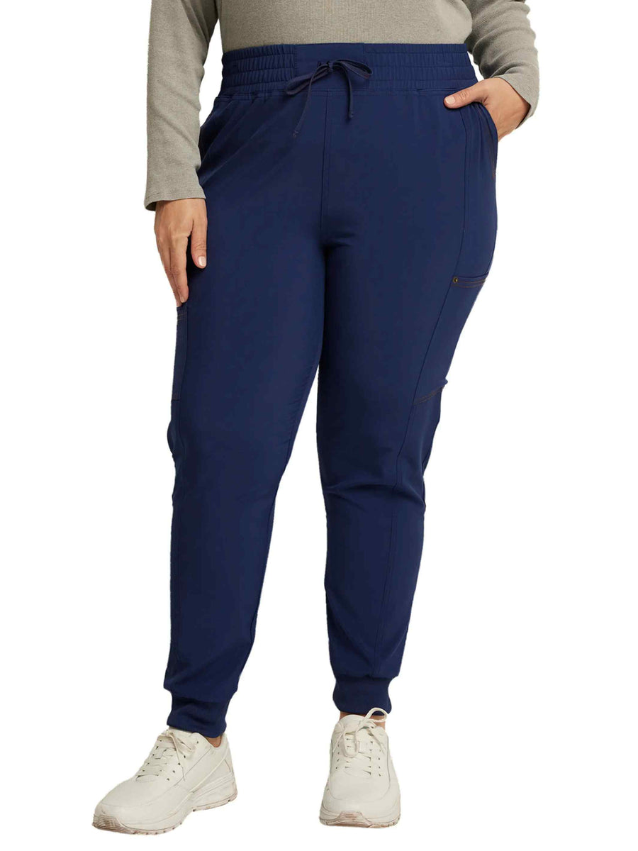 A look at the front of the Dickies Riveting Women's Mid Rise Scrub Jogger featuring a mid-rise waistband with an exterior drawstring.