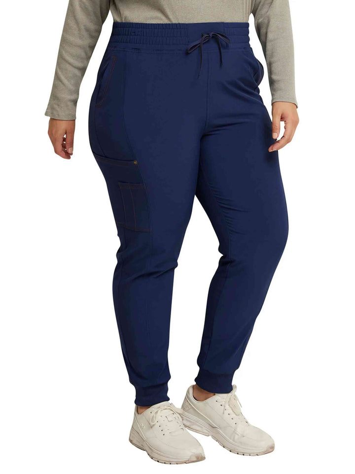 The right side of the Dickies Riveting Women's Mid Rise Scrub Jogger in Navy Blue size 3XL featuring ankle cuffs and a tapered leg.