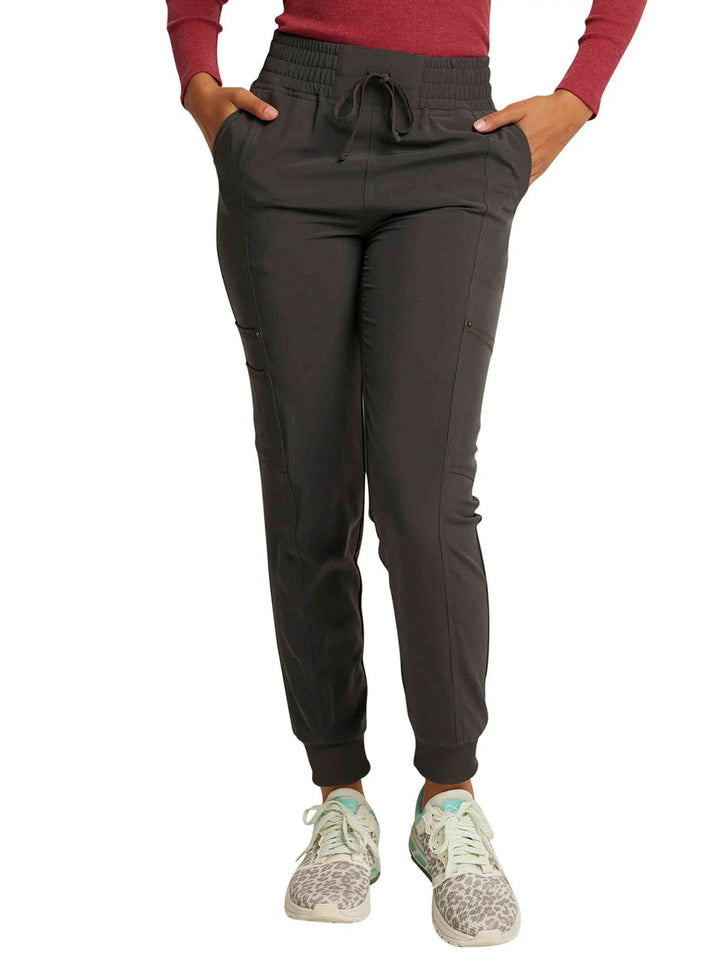 The front of the Dickies Riveting Women's Mid Rise Scrub Joggers in Pewter size Medium featuring a mid rise waistband with an exterior drawstring.