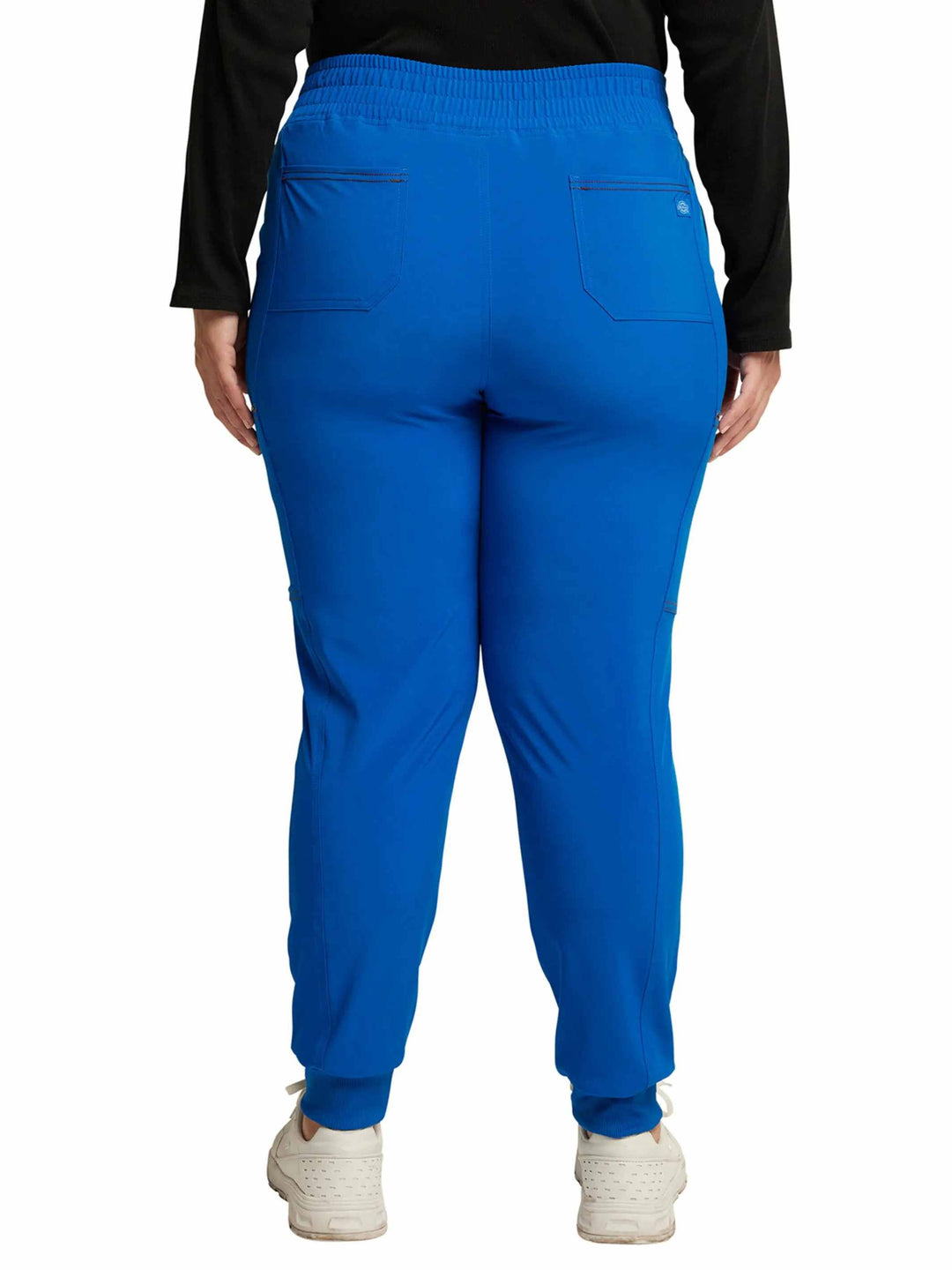 The back of the Dickies Riveting Women's Mid Rise Scrub Joggers in Royal Blue featuring two back patch pockets.