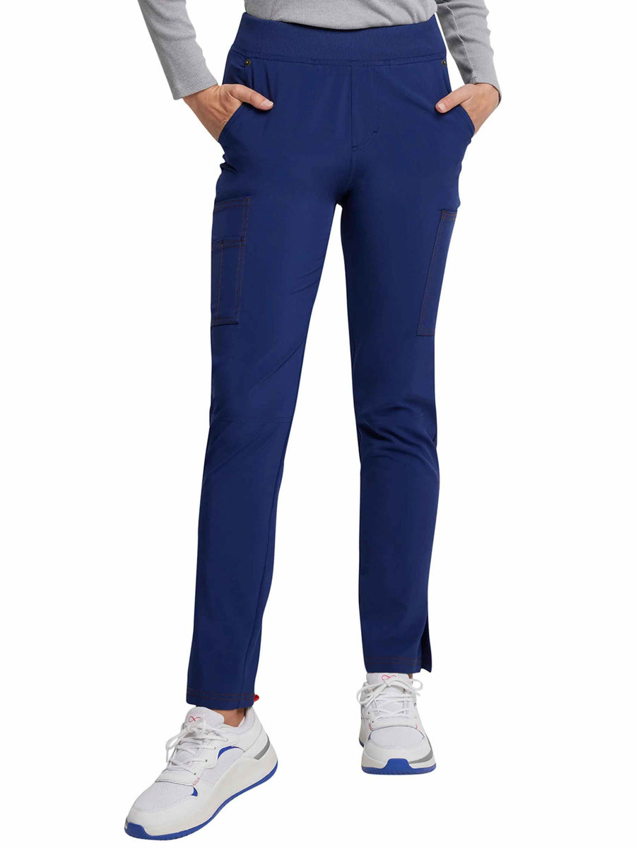 The front of the Dickies Riveting Women's Mid Rise Pull On Scrub Pants in Navy Blue featuring a total of seven pockets.