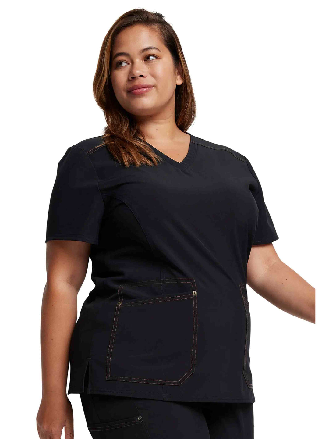 A young female Nurse showcasing the Dickies Riveting Women's V-Neck Top (DK747) on a white background.