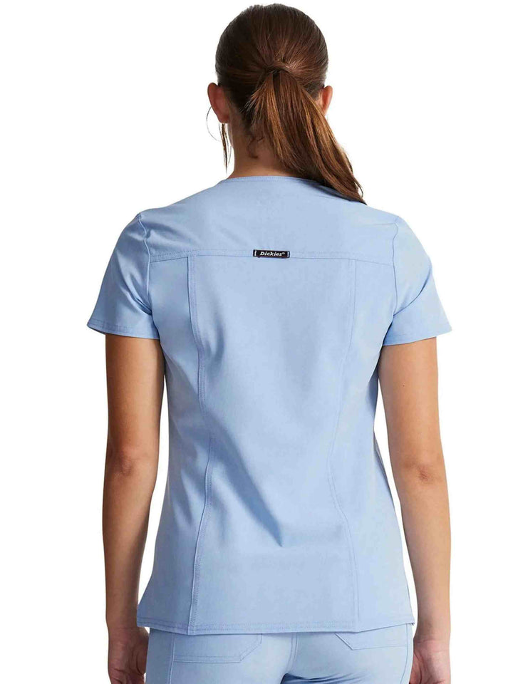 The back of the Dickies Riveting Women's V-neck Scrub Top in Light Chambray size medium featuring a center back length of 27.75".