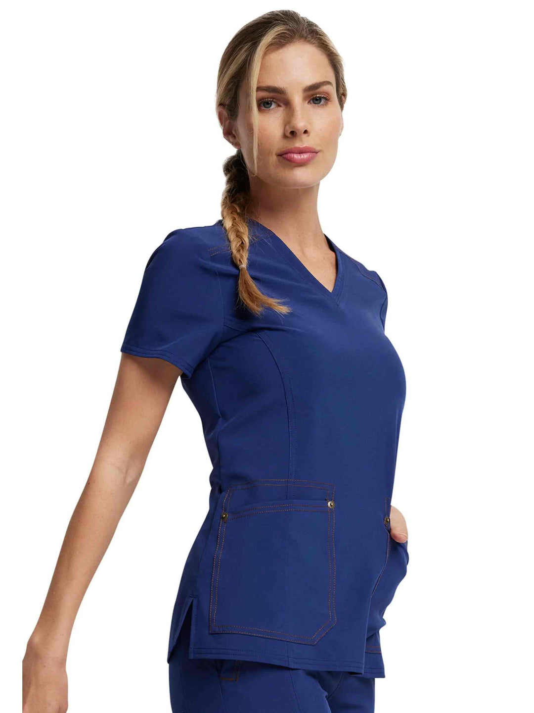 A look at the right side of the Dickies Riveting Women's V-neck Scrub Top in Navy Blue featuring stylish seaming throughout.