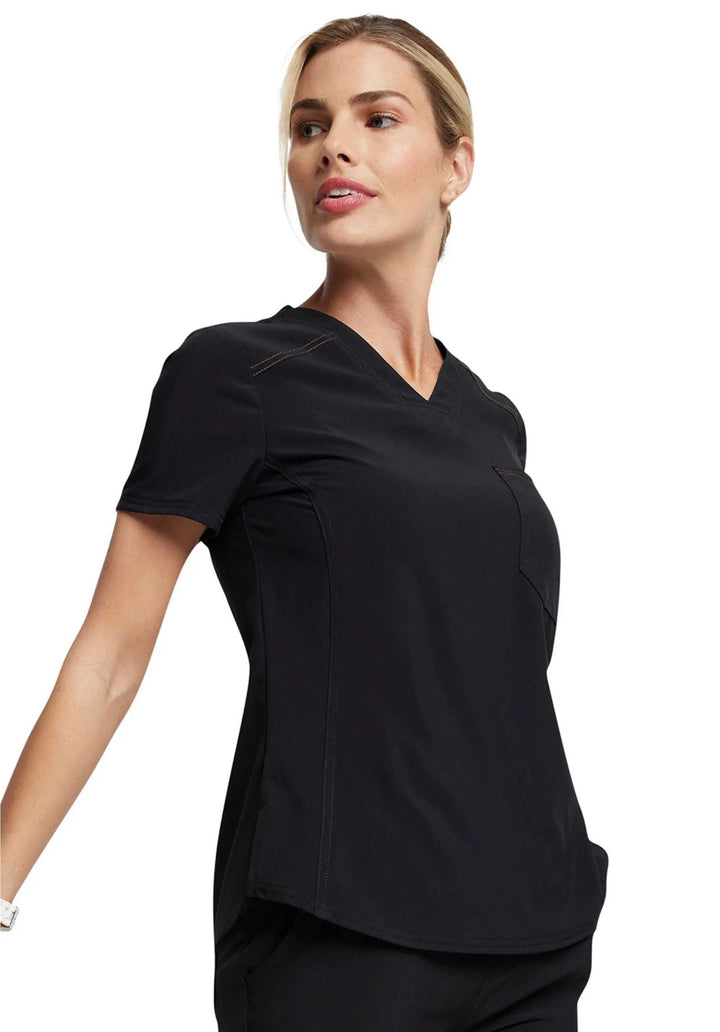 A look at the right side of the Dickies Riveting Women's Tuckable Scrub in Black size XS featuring one front chest pocket.