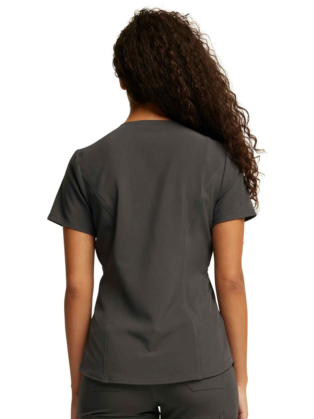 A look at the back of the Dickies Riveting Women's Tuckable V-neck Scrub Top in Pewter size Medium featuring a center back length of 26.75".