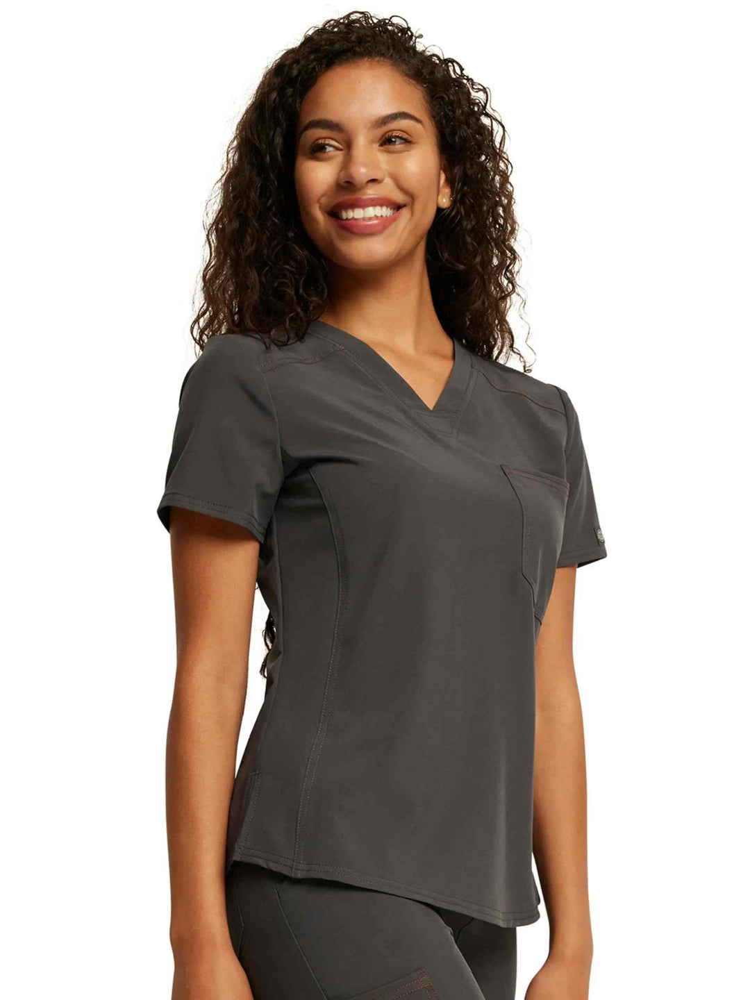 A look at the right side of the Dickies Riveting Women's Scrub Top in Pewter size XS featuring stylish seaming throughout.