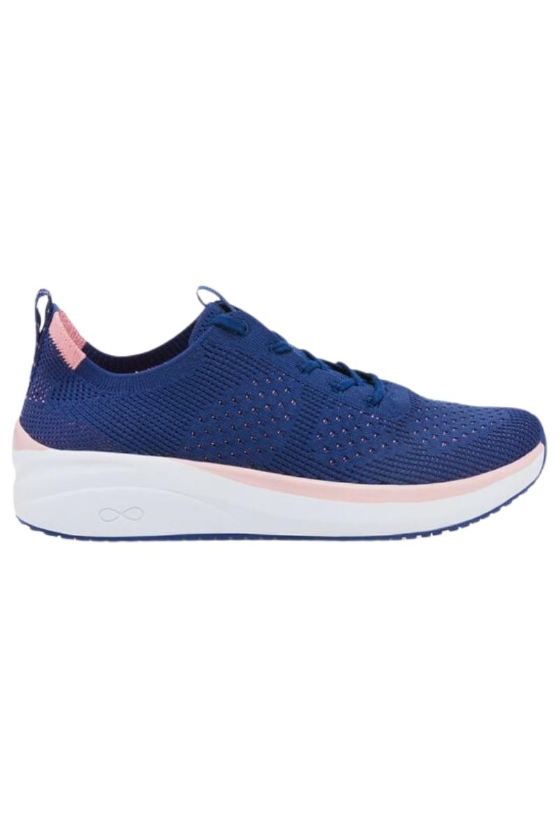 Infinity Everon Knit women’s nursing shoe in navy with pink trim – breathable slip-resistant work sneaker.