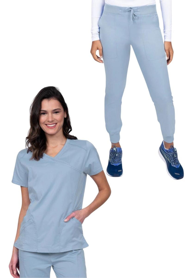 A look at the Epic by MedWorks Women's Knit Collar Mock Wrap Scrub Top and the Epic by MedWorks Women's Yoga Jogger Scrub Pant in Blue Fog.