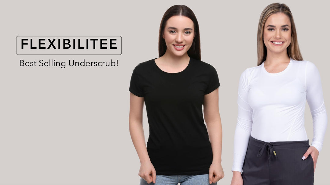 Two nurses showcasing some of the available t-shirts from Flexibilitee at Scrub Pro Uniforms.