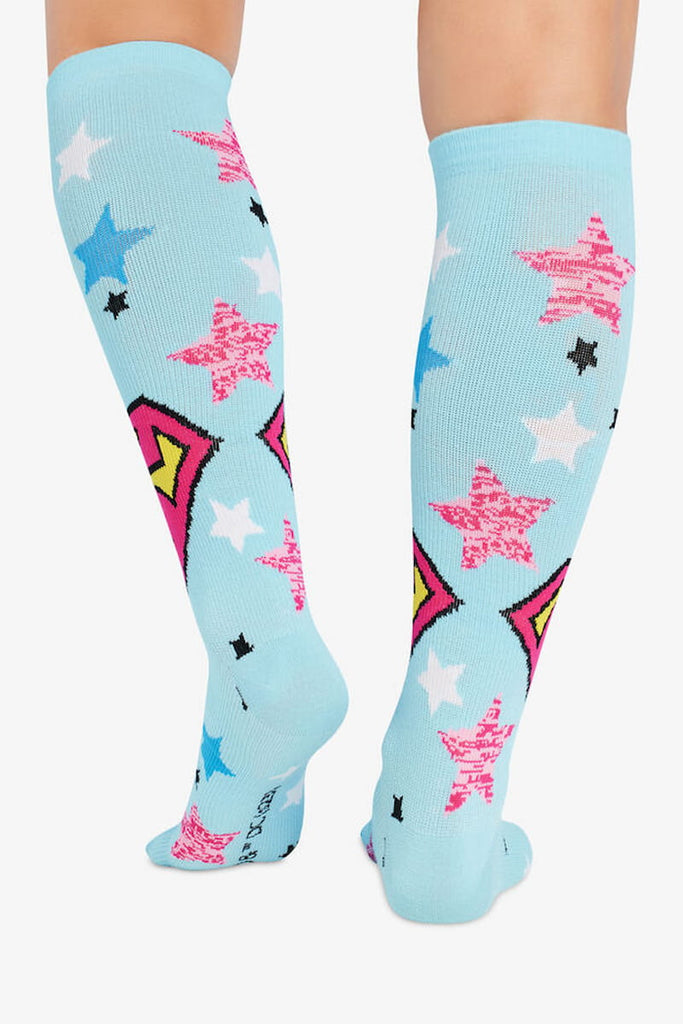 The back of the Cherokee Women's Printed Support Socks in Flying Hero featuring graduated compression gently squeezes your legs to improve circulation, reducing fatigue, aches, and swelling.