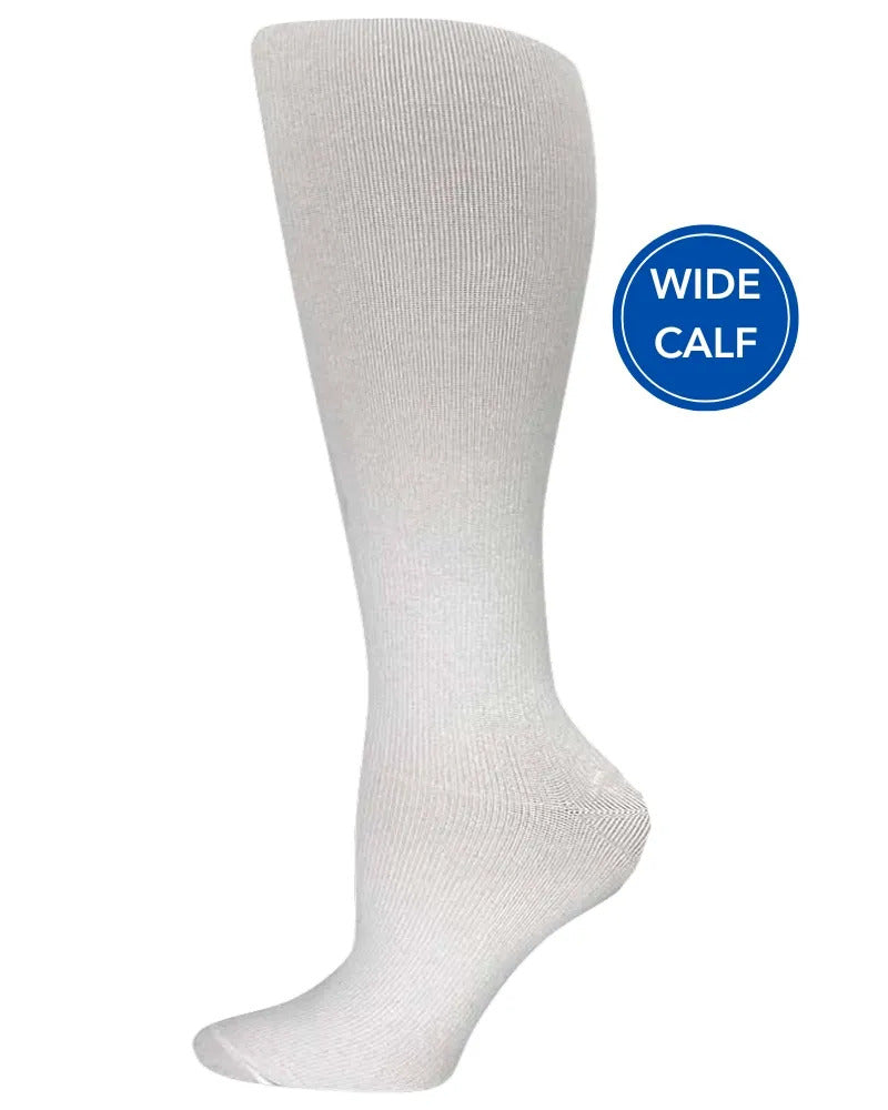 Foot mannequin displaying Pro-Motion Women's Wide Calf Compression Socks in White featuring a calf size of 17"-21".