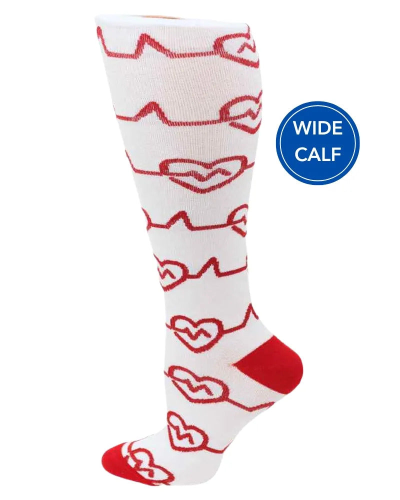 Foot mannequin displaying Pro-Motion Women's Wide Calf Compression Socks in EKG Hearts featuring a calf size of 17"-21".