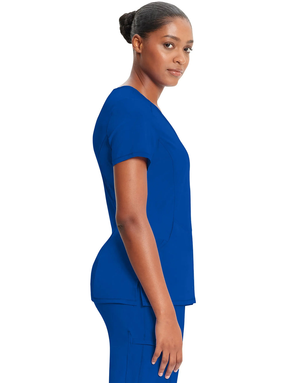 A look at the right side of the Infinity Women's Antimicrobial Mock Wrap Scrub Top in Galaxy Blue featuring side slits and short sleeves.