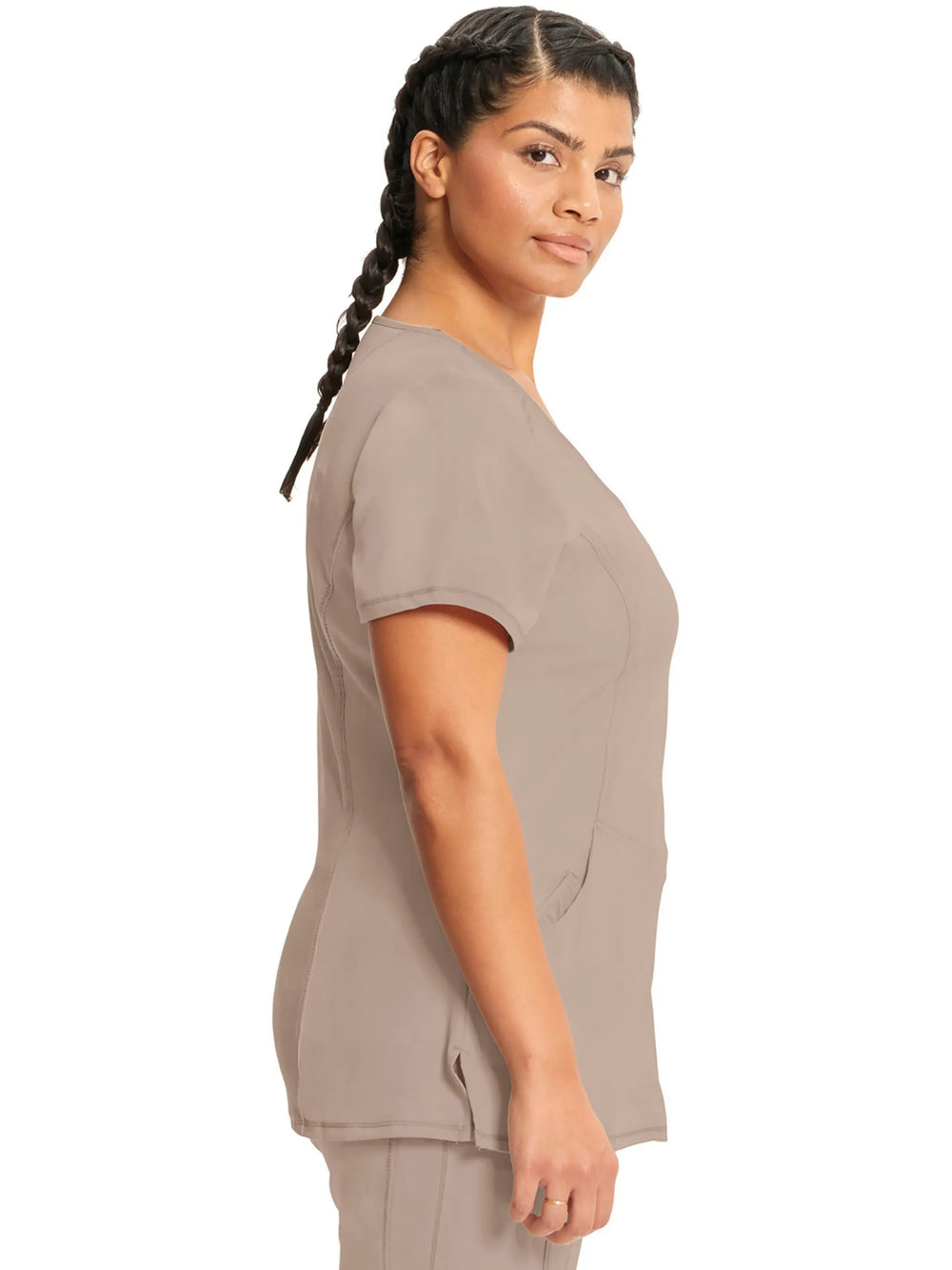 A look at the side of the Infinity Women's Mock Wrap Scrub Top (2625A) in Khaki featuring short sleeves and side slits.