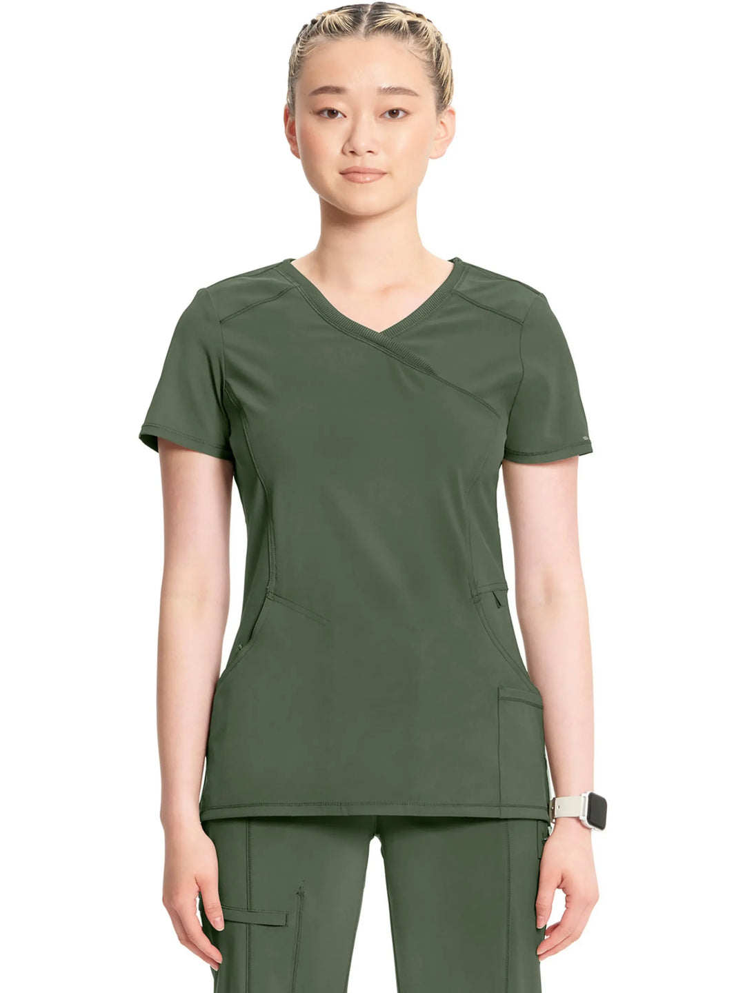 A look at the front of the Infinity Women's Mock Wrap Scrub Top (2625A) in Olive Green featuring stylish seaming throughout.