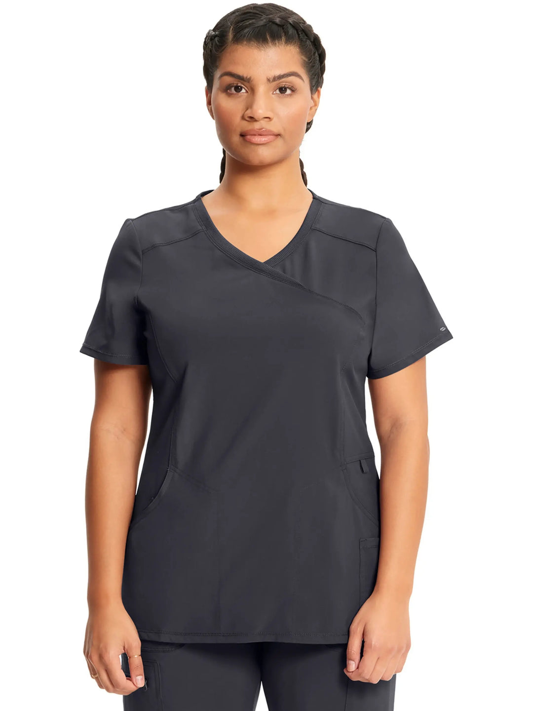 A young female Maternity Nurse displaying the front of the Infinity Women's Mock Wrap Antimicrobial Scrub Top in Pewter (Grey) on a white background.