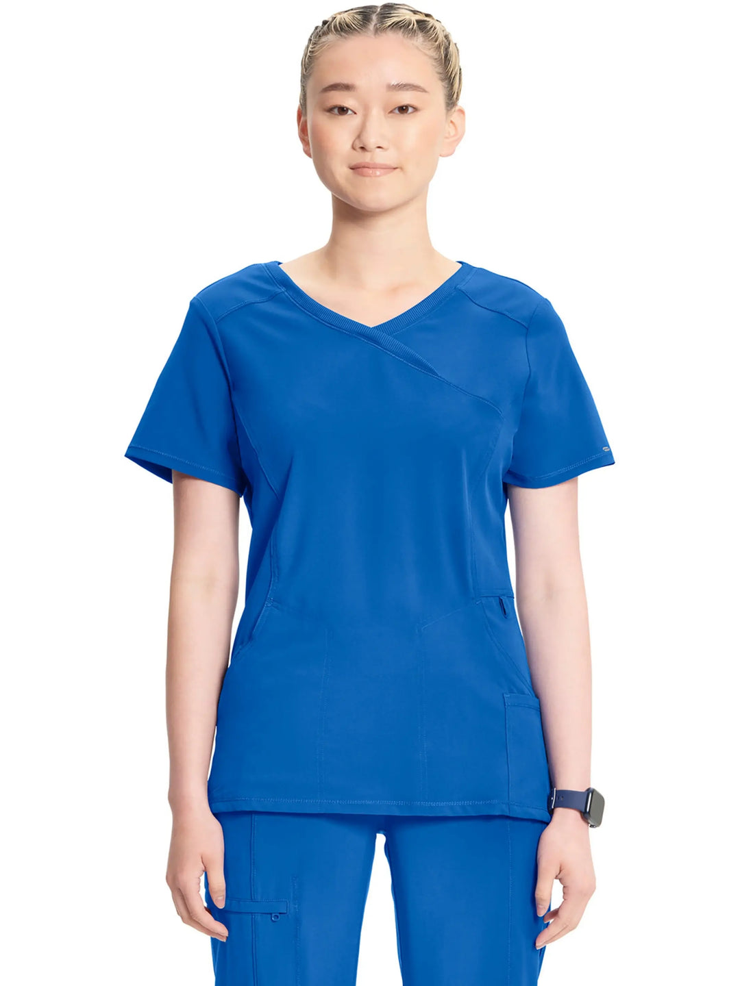 A look at the front of the Infinity Women's Mock Wrap Scrub Top (2625A) in Royal Blue featuring stylish seaming throughout and three pockets.