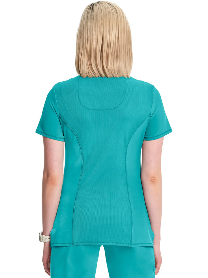 A look at the back of the Infinity Women's Mock Wrap Antimicrobial Scrub Top in Teal Blue size medium featuring a center back length of 26" and side slits.