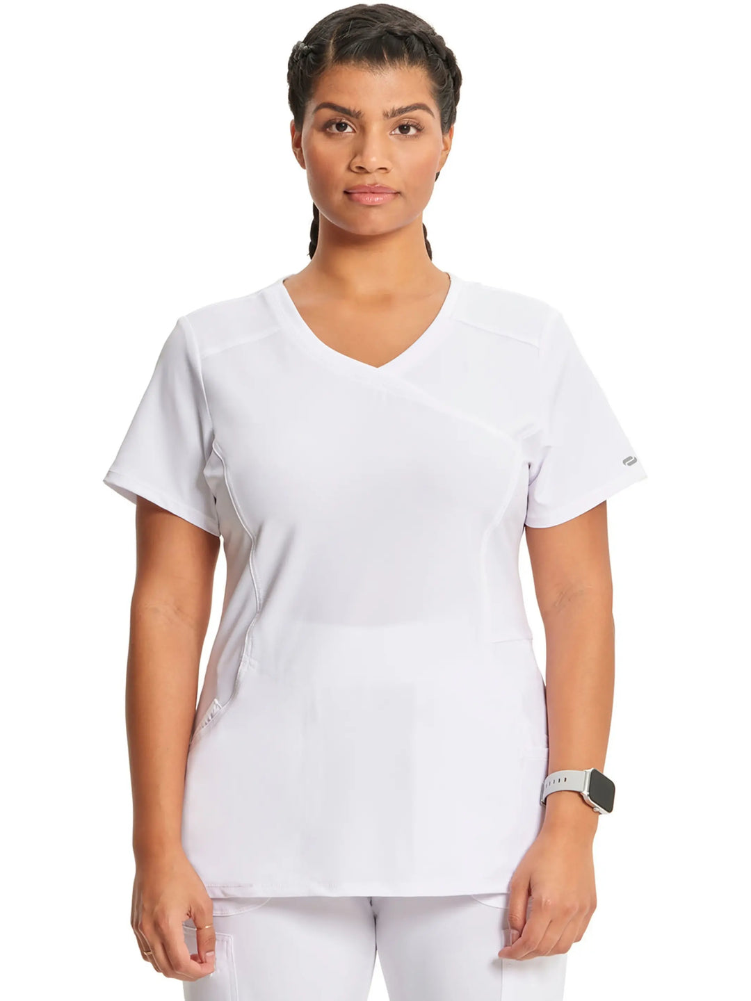 A look at the front of the Infinity Women's Mock Wrap Scrub Top (2625A) in White featuring stylish seaming throughout and three pockets.