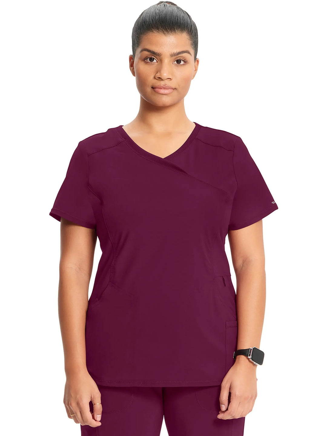 A look at the front of the Infinity Women's Mock Wrap Scrub Top (2625A) in Wine featuring stylish seaming throughout.