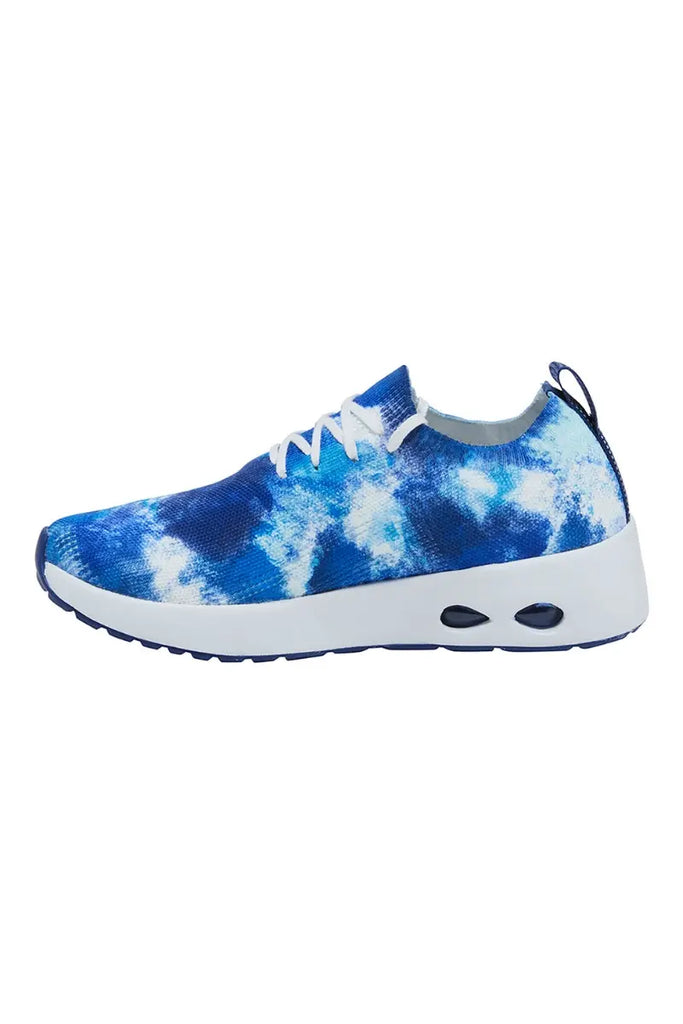 The inside profile of the Infinity Women's Bolt Premium Athletic Shoes in Navy Mist featuring an explosion of color with the Blue and White tie-dye design on the exterior of the shoe.